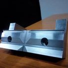 Custom precision fixture made from X155CrMoV121 tool steel for accurate round component positioning